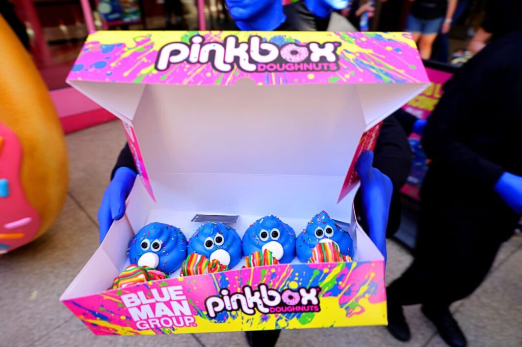 Pinkbox Doughnuts Blue Man Group appearance downtown Las Vegas at Plaza Hotel